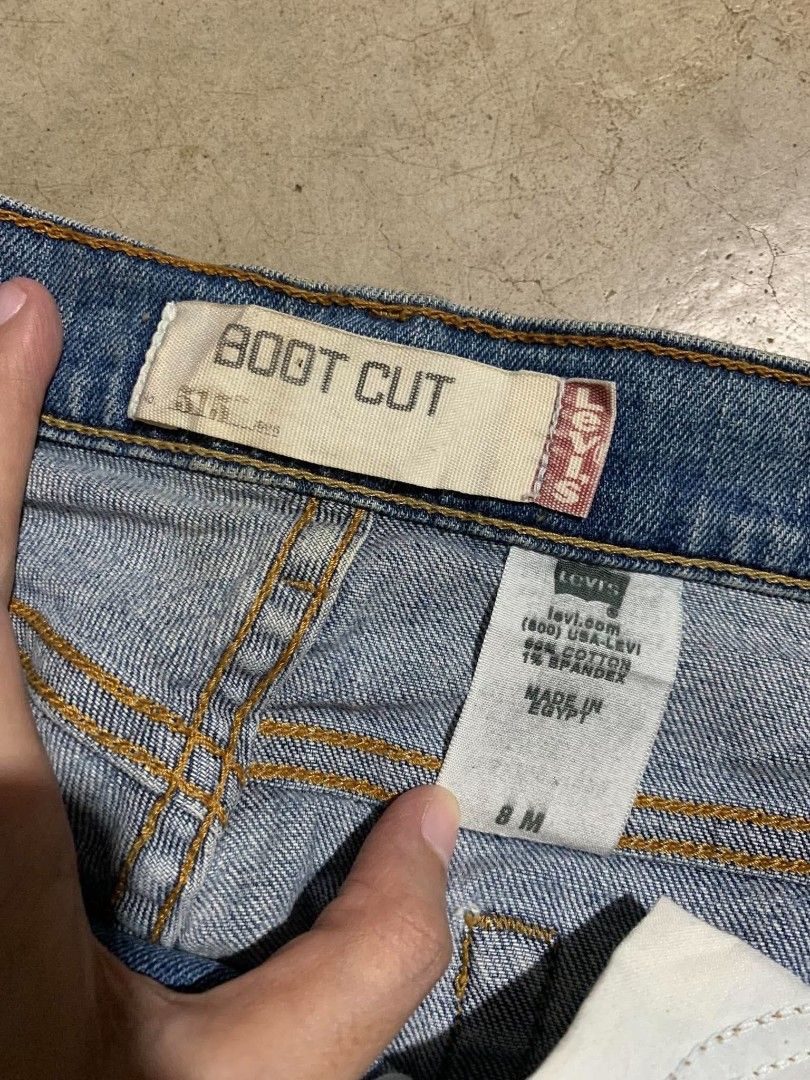 Levi's Boot Cut Jeans Size 8M Made in Egypt (Category: Jeans) located in Cavite. Submitted by noriegayou99586 (Listing ID 1464137824, Image 2). Description: - Brand: Levi's - Style: Boot Cut Jeans - Size: 8M - Color: Classic Blue Denim - Origin: Made in Egypt - Condition: Features some distressing on the hem (as pictured) - Ideal for: Casual wear.
