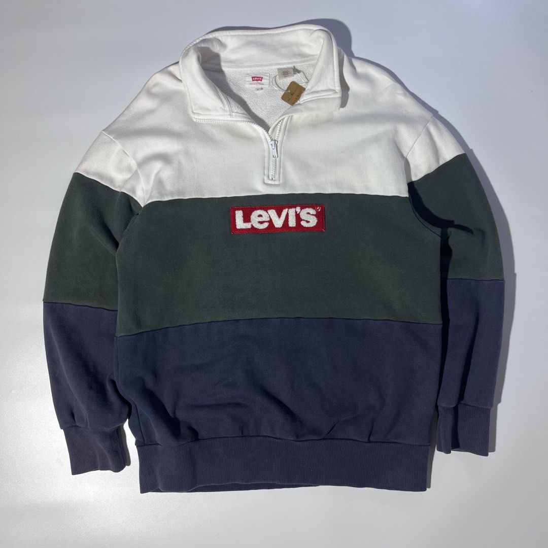 Levi's Color Block Quarter Zip Sweatshirt (Category: Coats, Jackets and Outerwear) located in Panabo. Submitted by bae.sick_thirft (Listing ID 1464143403, Image 1). Description: Quarter Zip Sweatshirt • Condition - Good • Color rate - 9.2/10 • Ribbings and hem masikip • Issue(s) - None • Perfect for dates Dimes: • Width - 20.5 • Lenght - 26 • Size - Small to Medium Price - 1999.