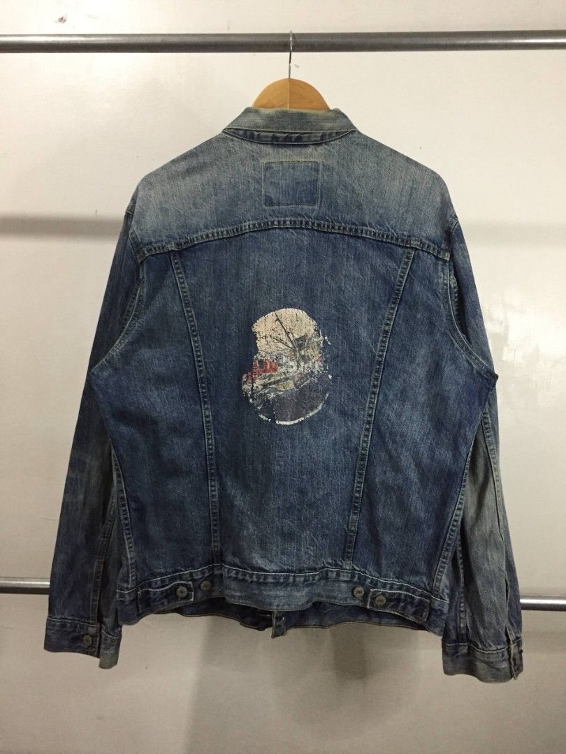 Levi's Denim Trucker Jacket (Category: Coats, Jackets and Outerwear) located in Balayan. Submitted by _wethrift (Listing ID 1464295861, Image 2). Description: Levi's Denim Trucker Jacket 🐎 - size XL - dimension 24 x 27.5 - excellent condition - color rate 9/10 - back print MINE - 📩 +shipping fee 📍 BALAYAN, BATANGAS.