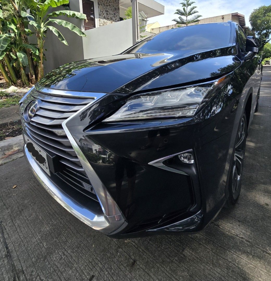 Lexus RX450 Hybrid Premium (A) (Category: Used Cars) located in Paranaque City. Submitted by pixel_2020 (Listing ID 1464304272, Image 3). Description: LEXUS RX450h Hybrid Top of the line Yr Model 2018 Company Car Issued as 1st owner But OR/CR under my name BGC casa maintained No fault and issue All working, still prestine condition Sunroof Color Black Exterior/Interior are intact Premium black leather seats all powered with seat memory All stock 