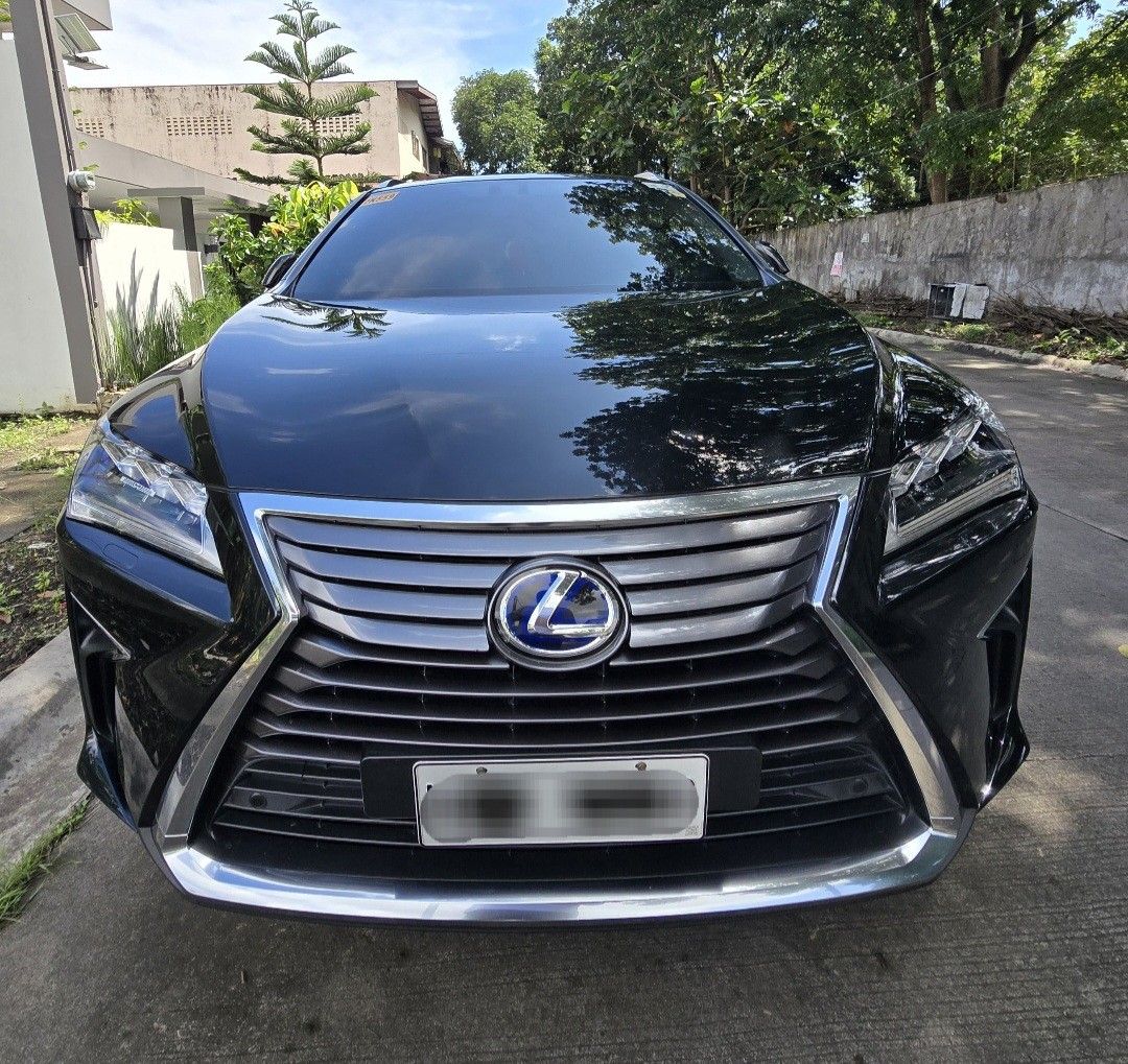 Lexus RX450 Hybrid Premium (A) (Category: Used Cars) located in Paranaque City. Submitted by pixel_2020 (Listing ID 1464304272, Image 1). Description: LEXUS RX450h Hybrid Top of the line Yr Model 2018 Company Car Issued as 1st owner But OR/CR under my name BGC casa maintained No fault and issue All working, still prestine condition Sunroof Color Black Exterior/Interior are intact Premium black leather seats all powered with seat memory All stock 
