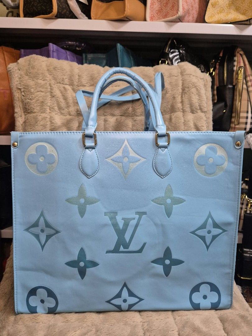 Light Blue Tote Bag with LV Monogram Pattern (Category: Tote Bags) located in Manila. Submitted by mysticfox.9b1678 (Listing ID 1464267814, Image 1). Description: - Light blue tote bag - Features iconic LV monogram pattern - Two comfortable top handles - Spacious interior, ideal for everyday essentials or a weekend trip - Comes with a cute fuzzy pillow for display purposes.