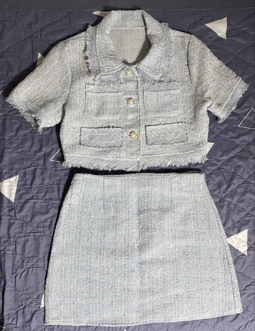 Light Blue Tweed Jacket and Skirt Set (Category: Sets or Coordinates) located in Manila. Submitted by silverhorse.07f3d0 (Listing ID 1464241010, Image 1). Description: - Cute light blue tweed set - Cropped jacket with stylish fringe details - Elegant pearl button closure - Matching mini skirt included - Ideal for a chic, fashionable look - Perfect for spring occasions or a night out.