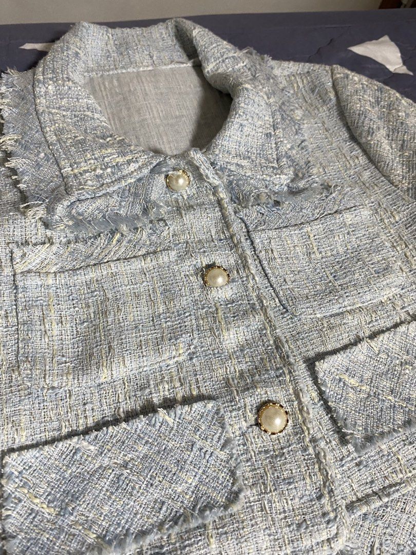 Light Blue Tweed Jacket and Skirt Set (Category: Sets or Coordinates) located in Manila. Submitted by silverhorse.07f3d0 (Listing ID 1464241010, Image 2). Description: - Cute light blue tweed set - Cropped jacket with stylish fringe details - Elegant pearl button closure - Matching mini skirt included - Ideal for a chic, fashionable look - Perfect for spring occasions or a night out.