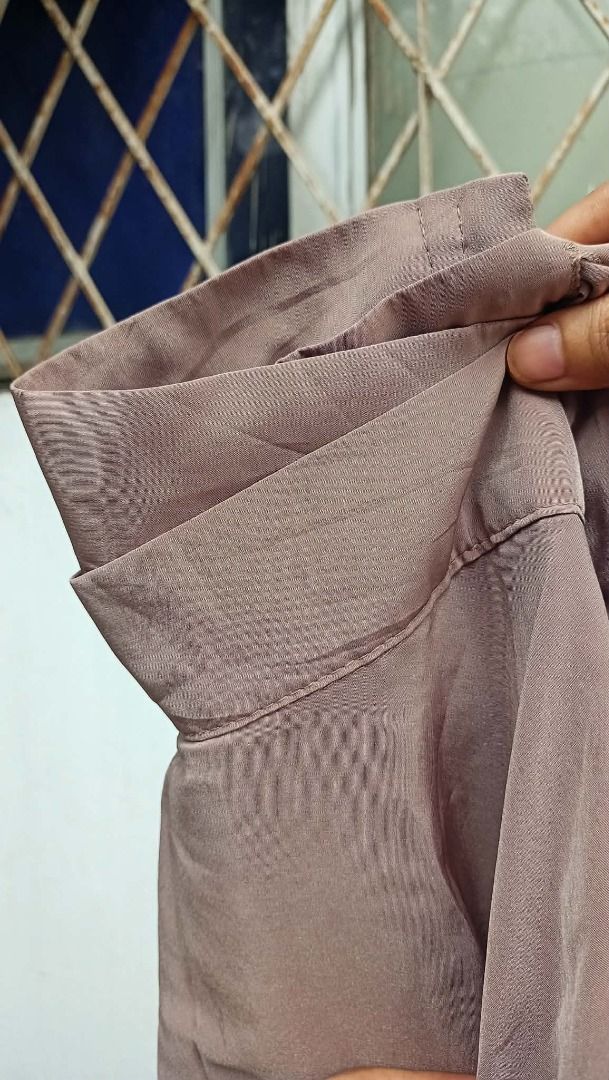 Light brown ruffled overlap skirt (Category: Skirts) located in Davao. Submitted by irisrazona16792 (Listing ID 1464143564, Image 2). Description: Waist 28-32 (adjustable waist tie) L 20 mall quality .
