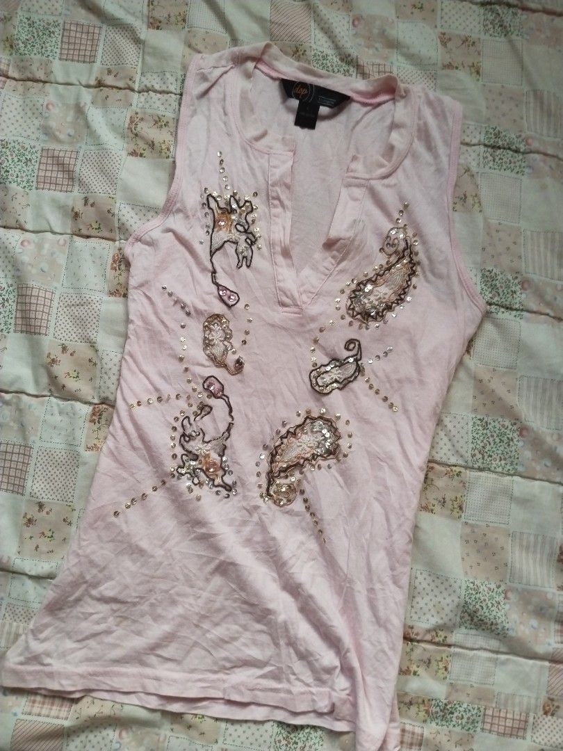 Light pink beaded sleeveless tank top (Category: Others Tops) located in Cebu City. Submitted by thrift_with_anjel (Listing ID 1464228168, Image 2). Description: ❀.ೃ࿔Light pink beaded sleeveless tank top❀.ೃ࿔* 🌹Brand: dop 🥀Flaw: Small stain 🌸Bust: 32-42 🌸Waist: 28-38 🌷Mine: 99 (AU).