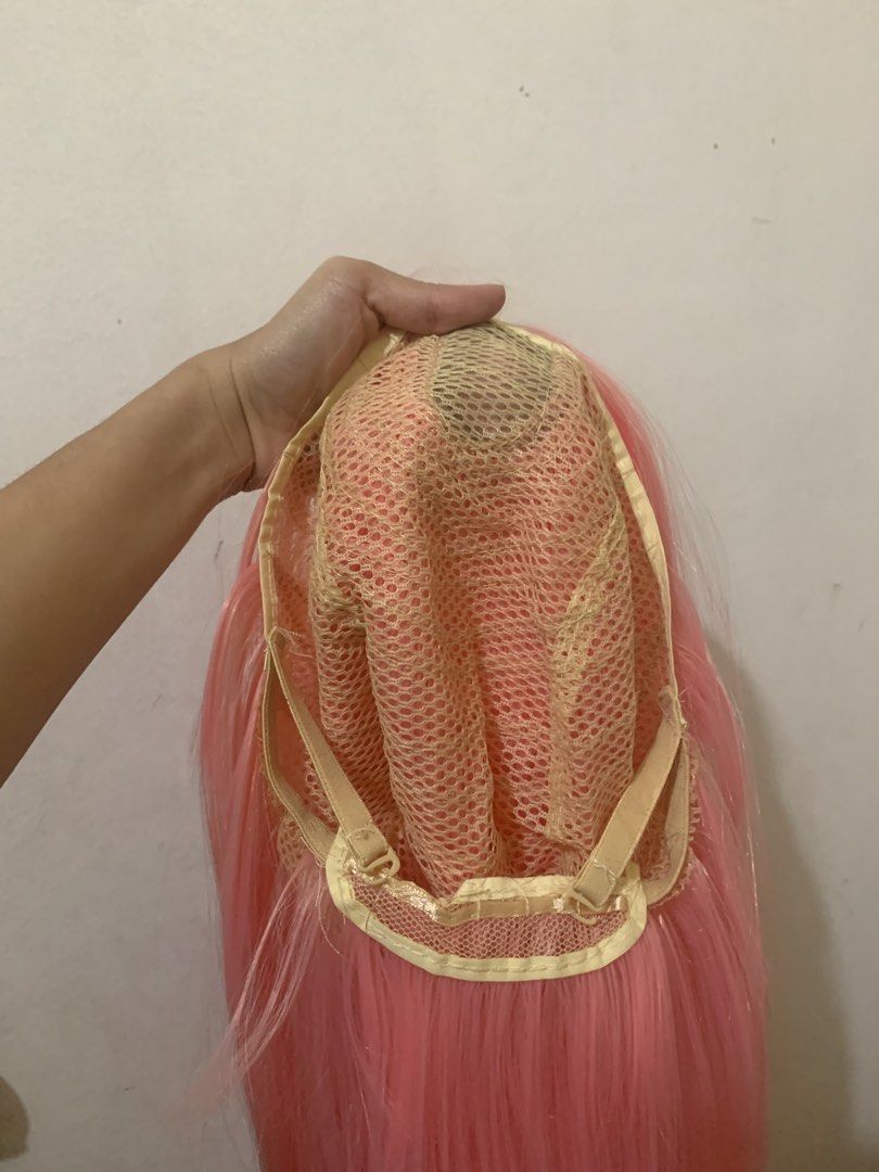 Light Pink Wig (Category: Hair Accessories) located in Manila. Submitted by issuhwhaaat (Listing ID 1464189973, Image 2). Description: Light Pink Wig Center part 100 cm Synthetic RFS: Bought the wrong shade of pink.