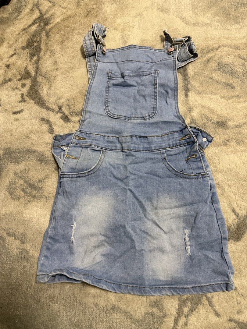 Light Wash Denim Overalls Dress (Category: Babies & Kids Fashion) located in Manila. Submitted by e.louise (Listing ID 1464332488, Image 2). Description: - Cute light wash denim overall dress - Distressed details on the skirt - Adjustable straps with button closure - Two front pockets and a bib pocket - Great for casual wear - Easy to pair with tops.