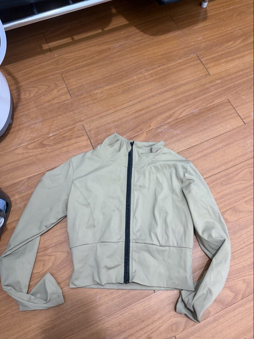 Lightweight Zip-Up Jacket (Category: Coats, Jackets and Outerwear) located in Manila. Submitted by e.louise (Listing ID 1464333870, Image 1). Description: - Lightweight zip-up jacket - Neutral beige color - High neckline with full zip closure - Long sleeves with fitted hem - Ideal for layering, workouts, or casual wear.