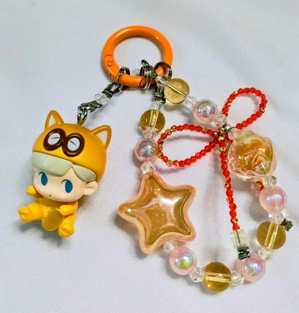 lilios authentic popmart popbeans DIY charms (Category: Charms) located in Caloocan City. Submitted by jark_moonshop (Listing ID 1464274909, Image 1). Description: authentic popmart popbeans DIY charms with marking. gift pouch and transparent blank tag is available with extra fee of 10pesos per set of pouch and blank tag for tag price can do lalamove or JNT .
