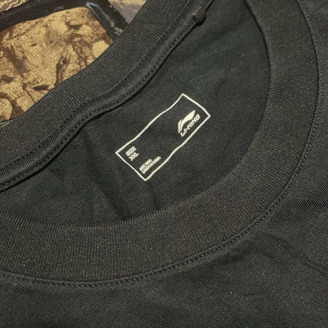 Li-Ning Lifestyle Training Summer Tee 'Black' (Category: Tshirts & Polo Shirts ) located in Manila. Submitted by kentjoshua051306 (Listing ID 1464152490, Image 3). Description: AUTHENTIC Li-Ning Lifestyle Training Summer Tee ‘Black’ (Model: AHST451-3) EXCELLENT CONDITION XXL ON TAG.