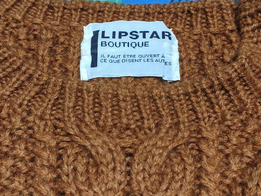 LIPSTAR Orange Chunky Knit Sweater (Category: Coats, Jackets and Outerwear) located in Baguio. Submitted by oberdosed (Listing ID 1464346853, Image 2). Description: LIPSTAR Orange Chunky Knit Sweater A thick, textured chunky knit in a vibrant hue for maximum coziness. Measurements: Length: 22" | Width: 20.5" | Sleeves: 21.5".