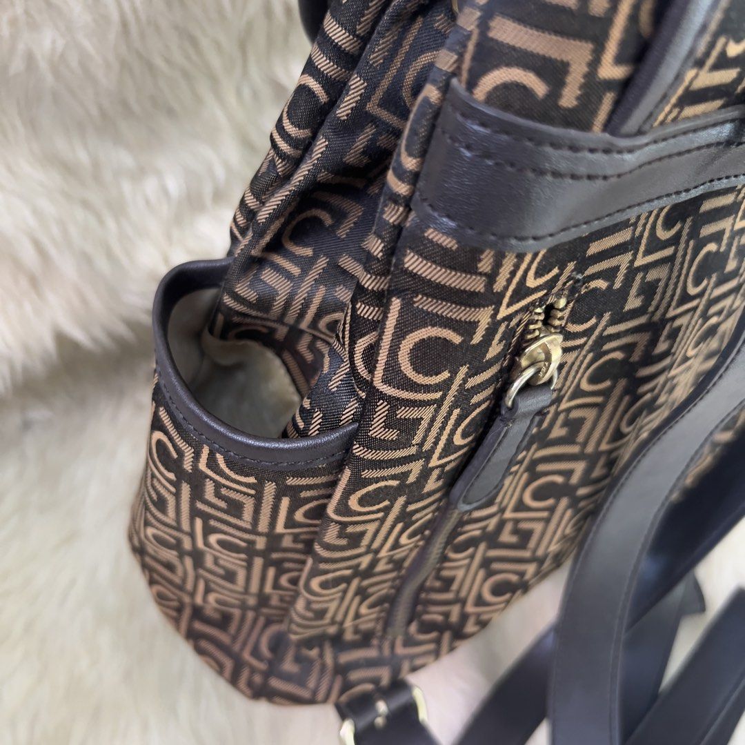 Liz Claiborne Brown Backpack (Category: Backpacks) located in Mandaue City. Submitted by heeba_inu2 (Listing ID 1464180293, Image 3). Description: - UNUSED Original Liz Claiborne bought from USA - many pockets! - flaws ONLY found in interior pockets from old age (check last slides) Price can be negotiated! Please feel free to DM for more info 💕.