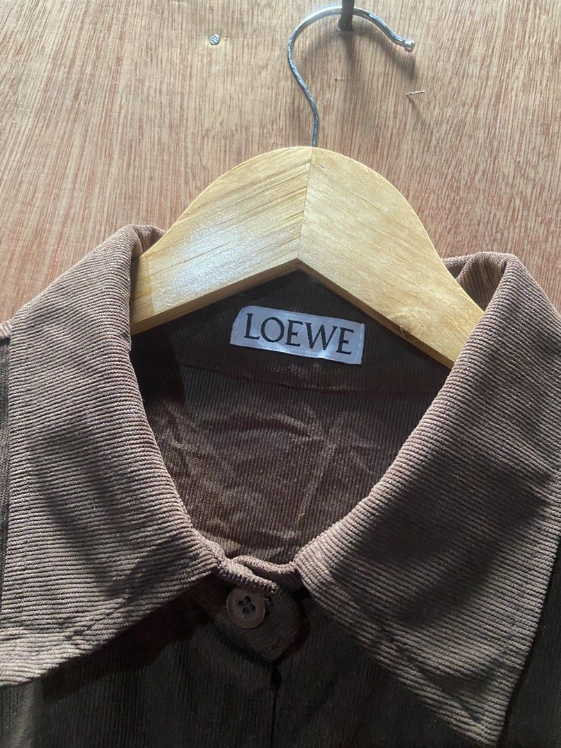 LOEWE BUTTON DOWN SLEEVELESS (Category: Sleeveless) located in Naga. Submitted by lux.shirt.ph (Listing ID 1464149834, Image 2). Description: LOEWE SIZE:XL DIMES:21x27 CONDITION:EXCELLENT COLOR RATE:9.3/10 ISSUE:MISSING WASH LABEL.