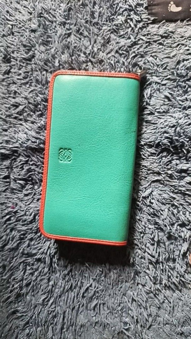 Loewe wallet (Category: Wallets & Card Holders) located in Bulacan. Submitted by jhefkheelo02163 (Listing ID 1464147362, Image 1). Description: Loewe long wallet Detailed posted .