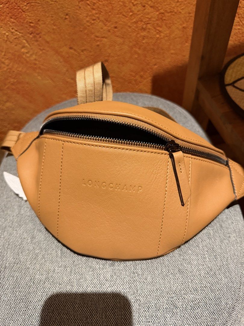 Longchamp Leather Belt Bag Tan (Category: Luxury Bags & Wallets) located in Cebu City. Submitted by juicyjjjj (Listing ID 1464291811, Image 1). Description: - Genuine calf leather fanny pack by Longchamp - Secure zipper closure - Adjustable strap with buckle for a custom fit - Interior features a convenient card slot -No dust bag Purchased in CDG airport.