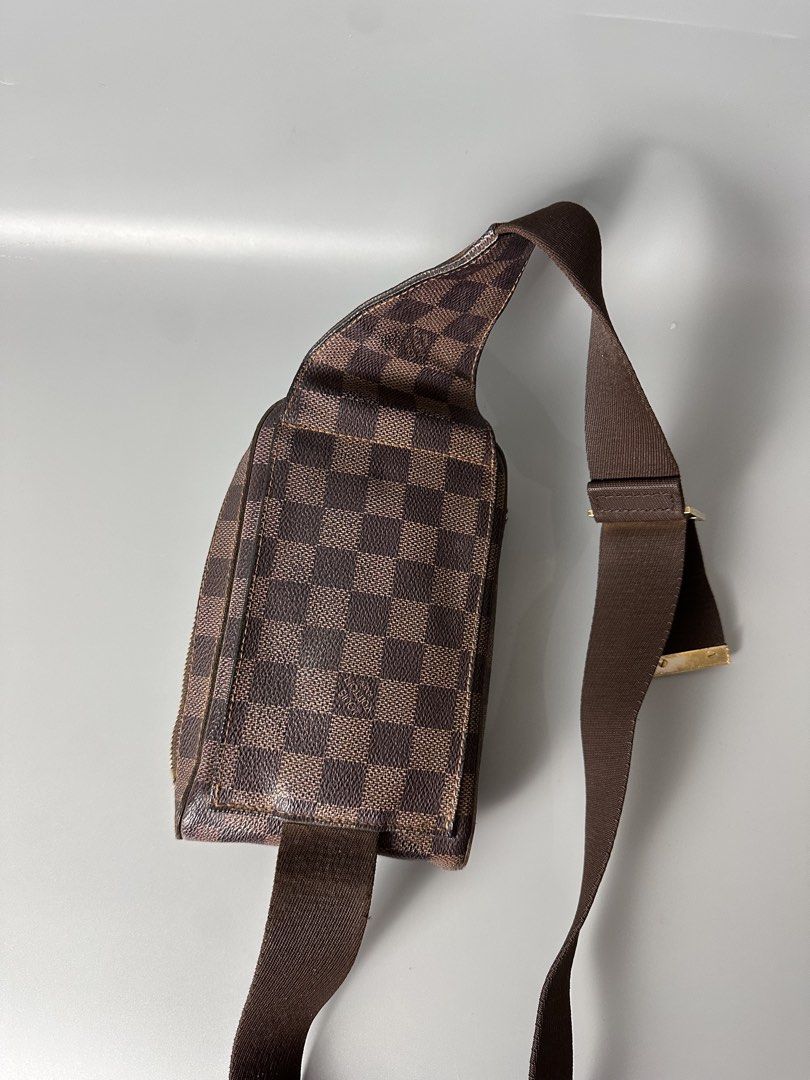 Louis Vuitton Damier Ebene Canvas Sling Bag (Category: Luxury Bags & Wallets) located in Bacolod City. Submitted by thestitchph (Listing ID 1464154141, Image 3). Description: - Authentic Louis Vuitton sling bag - Damier Ebene canvas - Versatile: crossbody or waist bag - Clean interior with bright orange lining - Smooth zipper - Ideal for everyday use.