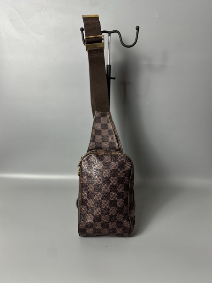 Louis Vuitton Damier Ebene Canvas Sling Bag (Category: Luxury Bags & Wallets) located in Bacolod City. Submitted by thestitchph (Listing ID 1464154141, Image 1). Description: - Authentic Louis Vuitton sling bag - Damier Ebene canvas - Versatile: crossbody or waist bag - Clean interior with bright orange lining - Smooth zipper - Ideal for everyday use.