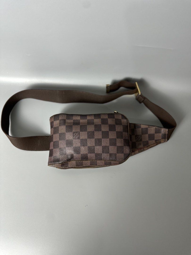 Louis Vuitton Damier Ebene Canvas Sling Bag (Category: Luxury Bags & Wallets) located in Bacolod City. Submitted by thestitchph (Listing ID 1464154141, Image 2). Description: - Authentic Louis Vuitton sling bag - Damier Ebene canvas - Versatile: crossbody or waist bag - Clean interior with bright orange lining - Smooth zipper - Ideal for everyday use.