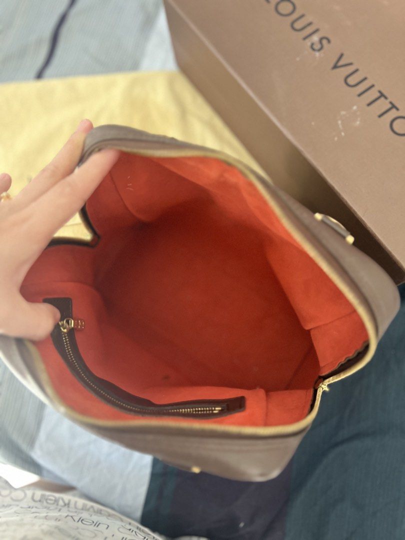 Louis Vuitton Damier Ebene Canvas Handbag (Category: Luxury Bags & Wallets) located in Marikina City. Submitted by l.factors (Listing ID 1464308853, Image 2). Description: ➡️Guaranteed Authentic. ➡️Comes with Dustbag & box ➡️Still Negotiable ➡️You can personally check the bag & pick up AT HOME for assurance. 📍 Marikina Heights, Marikina City - Classic Louis Vuitton bag - Damier Ebene canvas with iconic checkered pattern - Genuine leather trim an