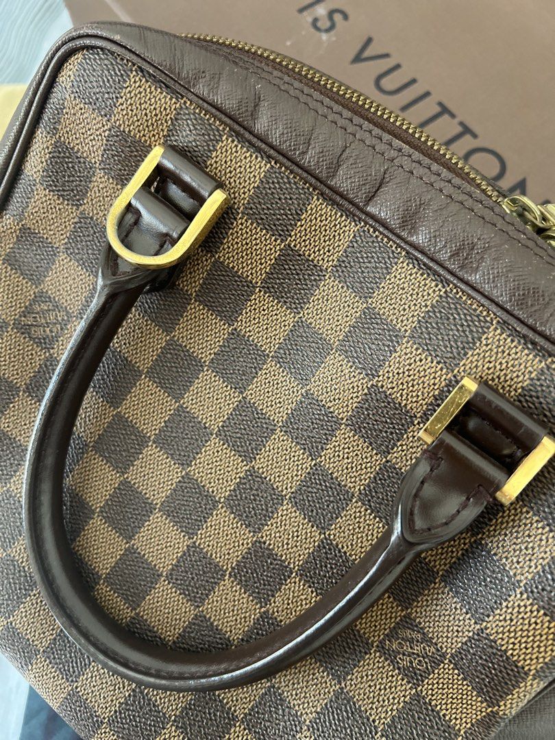 Louis Vuitton Damier Ebene Canvas Handbag (Category: Luxury Bags & Wallets) located in Marikina City. Submitted by l.factors (Listing ID 1464308853, Image 3). Description: ➡️Guaranteed Authentic. ➡️Comes with Dustbag & box ➡️Still Negotiable ➡️You can personally check the bag & pick up AT HOME for assurance. 📍 Marikina Heights, Marikina City - Classic Louis Vuitton bag - Damier Ebene canvas with iconic checkered pattern - Genuine leather trim an