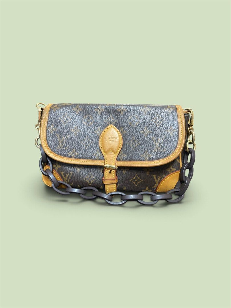 Louis Vuitton Diane Monogram Canvas Shoulder Bag (Category: Luxury Bags & Wallets) located in Baguio. Submitted by SweetRepeat (Listing ID 1464160485, Image 1). Description: - Classic Louis Vuitton monogram shoulder bag - Iconic LV print - Elegant tan leather trim - Shiny gold-tone hardware - Chunky chain strap for comfortable carrying, replaced - Interior zippered pocket for essentials - Ideal for everyday style and practicality -coded -flawless