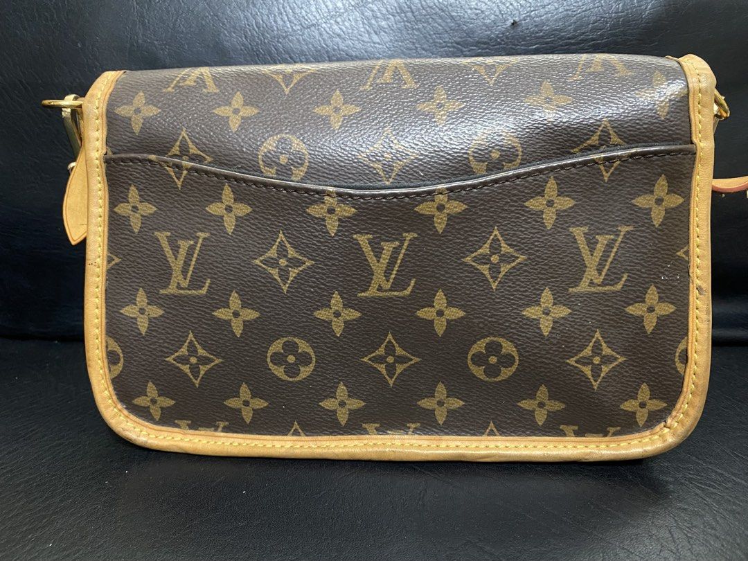 Louis Vuitton Diane Monogram Canvas Shoulder Bag (Category: Luxury Bags & Wallets) located in Baguio. Submitted by SweetRepeat (Listing ID 1464160485, Image 2). Description: - Classic Louis Vuitton monogram shoulder bag - Iconic LV print - Elegant tan leather trim - Shiny gold-tone hardware - Chunky chain strap for comfortable carrying, replaced - Interior zippered pocket for essentials - Ideal for everyday style and practicality -coded -flawless