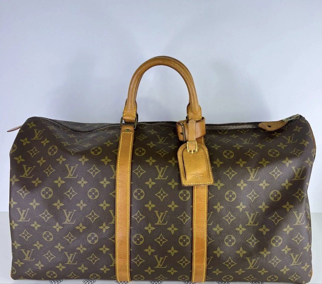 Louis Vuitton LV Keepall 55 in Monogram Canvass (824) (Category: Luxury Bags & Wallets) located in Taguig. Submitted by markethunt (Listing ID 1464297008, Image 1). Description: Louis Vuitton Keepall 55 – Vintage Monogram Vintage Louis Vuitton Keepall 60 in classic Monogram canvas with genuine vachetta leather trim and brass hardware. Beautiful vintage character and patina. ✨ Vintage piece with signs of age/wear consistent with its era 📸 Please 