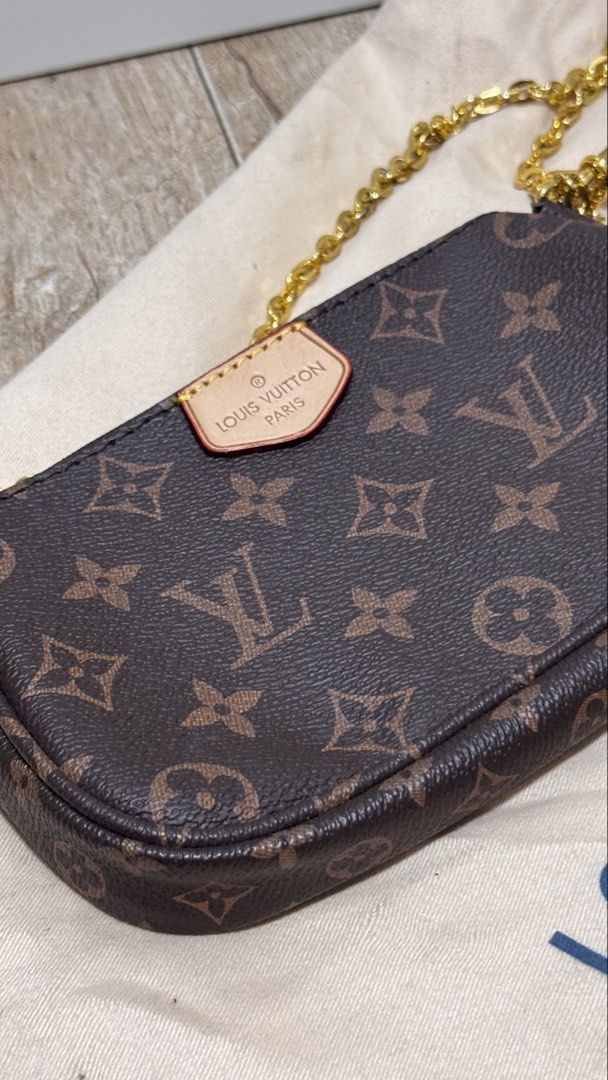 Louis Vuitton Monogram Pouch and Coin Purse Set (Category: Luxury Bags & Wallets) located in Pasig City. Submitted by sdpii (Listing ID 1464234112, Image 2). Description: - Louis Vuitton monogram pouch and round coin purse set. - Features classic monogram canvas and durable material. - Both pieces come with elegant gold hardware. - Includes a stylish chain strap for easy carrying. - Pouch is long and slim, ideal for essentials. - Coin purse is ci