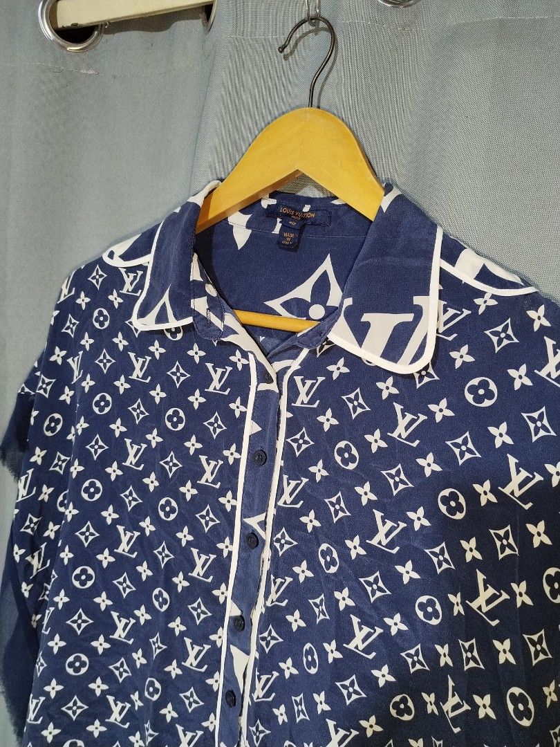 Louis Vuitton Monogram Silk Shirt (Category: Luxury Apparel) located in Pasig City. Submitted by loveforlux_2025 (Listing ID 1464342202, Image 3). Description: - Authentic Louis Vuitton shirt - Color: Navy blue - All-over monogram print - White piping detail - Button-up front - Material: Lightweight silk - Size: 40 (Italian sizing) - Made in Italy - A true statement piece for fashion enthusiasts.