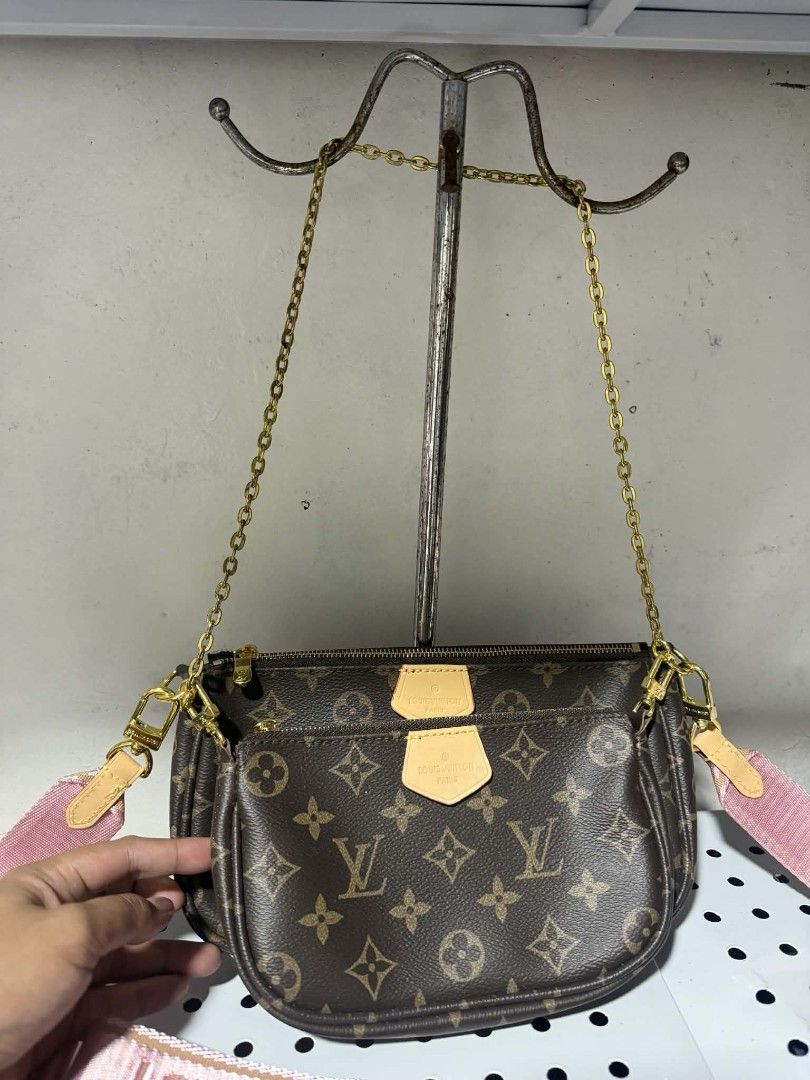 Louis Vuitton Multi Pochette Accessoires Pink Strap (Category: Luxury Bags & Wallets) located in Antipolo. Submitted by robannrave98496 (Listing ID 1464297873, Image 3). Description: Louis Vuitton Multi Pochette Accessoires - Classic monogram canvas - Chic pink strap - Includes: Main pouch, mini pouch, and coin purse - Gold hardware - Adjustable strap for crossbody or shoulder wear - Highly versatile.
