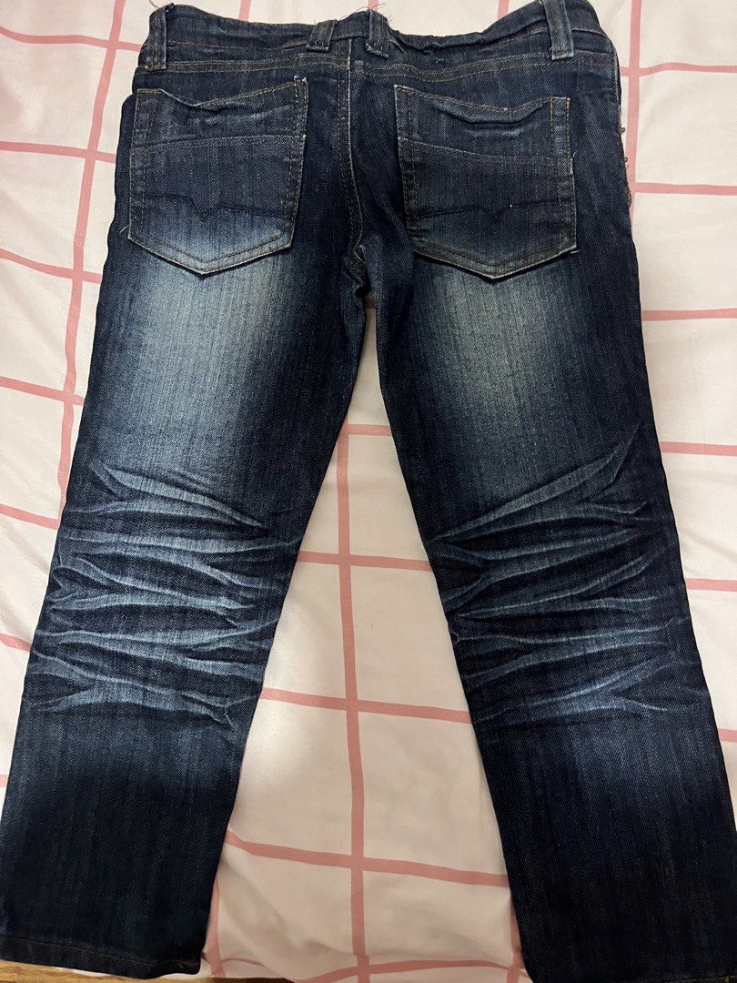 Low waisted Denim capri (Category: Jeans) located in Manila. Submitted by chimcheese (Listing ID 1464138572, Image 3). Description: - Kage Classic dark wash denim jeans - Distressed look with leg creasing - Button and zip front closure - Standard pocket layout - Perfect for casual wear.