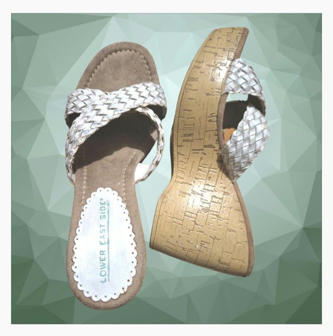 Lower East Side Wedge Slip on (Category: Sandals) located in Paranaque City. Submitted by calm_youngstore7 (Listing ID 1464320824, Image 3). Description: PRICE DROP! LAST PIECESALE! Lower East Side White Braided Slide Wedge heels These iconic slip-on mules showcase a characteristic silhouette with cross-over woven straps, a cushioned tan faux-suede footbed, and a high, lightweight faux-cork platform wedge heel. Size 5 and 6.