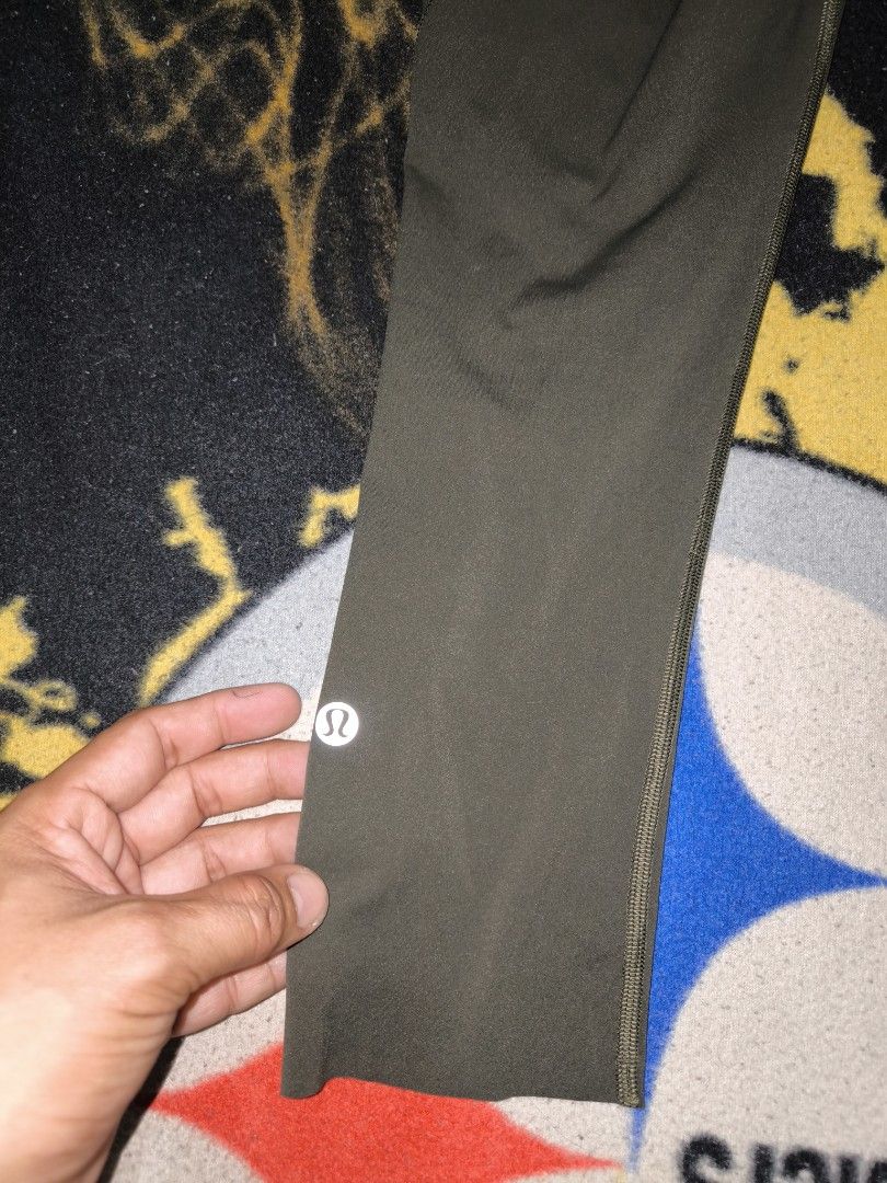 Lululemon Align Crop Leggings (Category: Activewear) located in Manila. Submitted by fljaoti27 (Listing ID 1464258334, Image 3). Description: - Lululemon Align Crop Leggings - Color: Olive Green - Size: 2 - Features: Side pockets, reflective details on calves - Material: Comfortable and stretchy - Ideal for: Workouts, everyday wear.