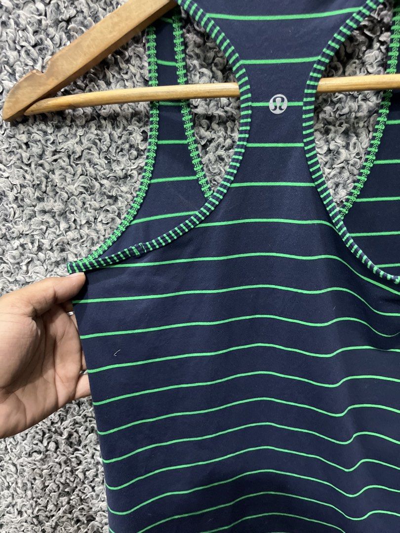 Lululemon Cool Racerback Tank Top | Size 8 (Category: Activewear) located in General Trias. Submitted by zrchustle.604 (Listing ID 1464205107, Image 3). Description: Lululemon Cool Racerback Tank Top in the pattern Slalom Stripe Inkwell / Hyper Stripe Green Bean. It is a classic, form-fitting workout tank first released in September 2013. Product Details • Brand: Lululemon • Style: Cool Racerback (CRB) • Color Code: SSIW/HSGB (Inkwell Navy Blue /