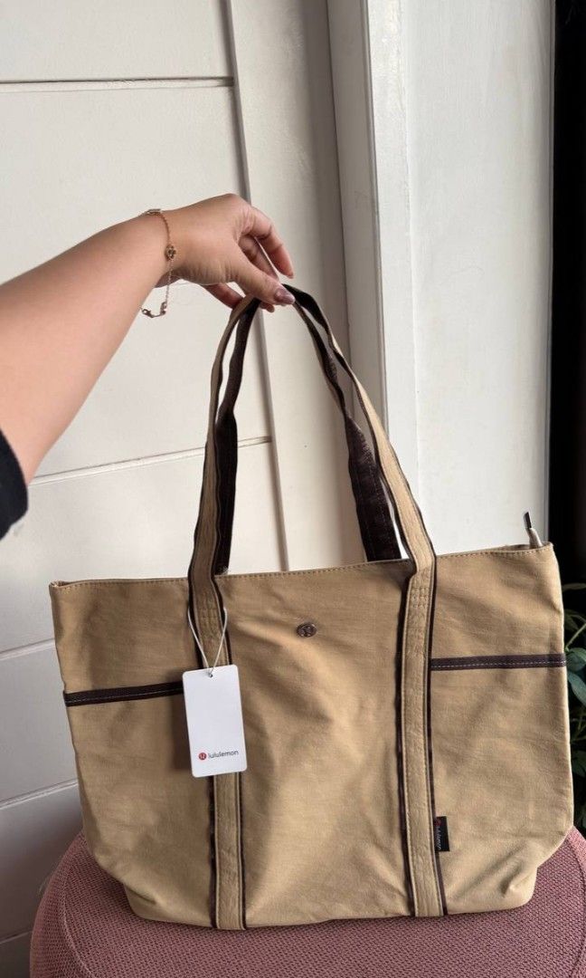 Lululemon Daily Multi Pocket Canvas Tote Bag (Category: Tote Bags) located in Manila. Submitted by whimsy.finds (Listing ID 1464200395, Image 1). Description: Size: 18" w 10" h Payment first basis via Gcash / Maribank / Maya Ship via JNT ONLY *No rush shipping *Open for bulk order.