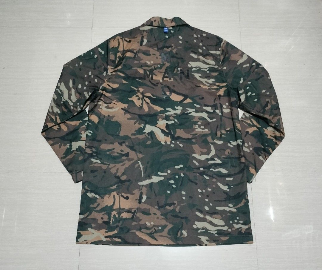 MADNESS CAMOU WINDBREAKER (Category: Coats, Jackets and Outerwear) located in Sariaya. Submitted by social_animalz (Listing ID 1464296736, Image 2). Description: 23 x 34 nylon materials adjustable cuffs shipping fee is not included.