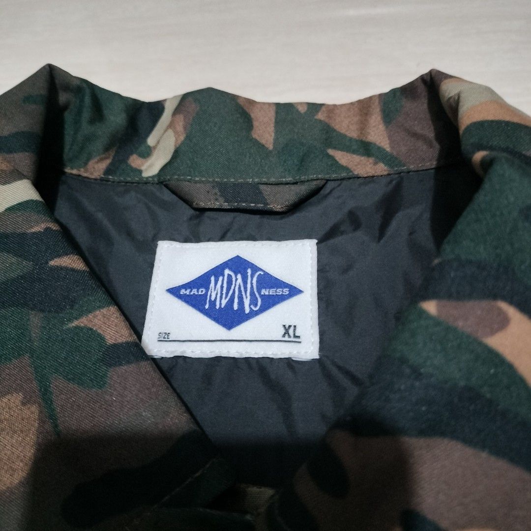 MADNESS CAMOU WINDBREAKER (Category: Coats, Jackets and Outerwear) located in Sariaya. Submitted by social_animalz (Listing ID 1464296736, Image 3). Description: 23 x 34 nylon materials adjustable cuffs shipping fee is not included.