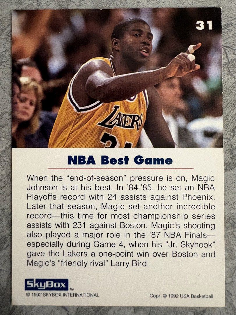 Magic Johnson (Category: Raw Singles) located in Manila. Submitted by steadycards80 (Listing ID 1464164120, Image 2). Description: - 1992 SkyBox NBA Best Game Card - Features Earvin 'Magic' Johnson - Highlights 1984-85 season record of 24 assists - Mentions 231 assists in the 1987 NBA Finals - Excellent collectible for basketball fans.