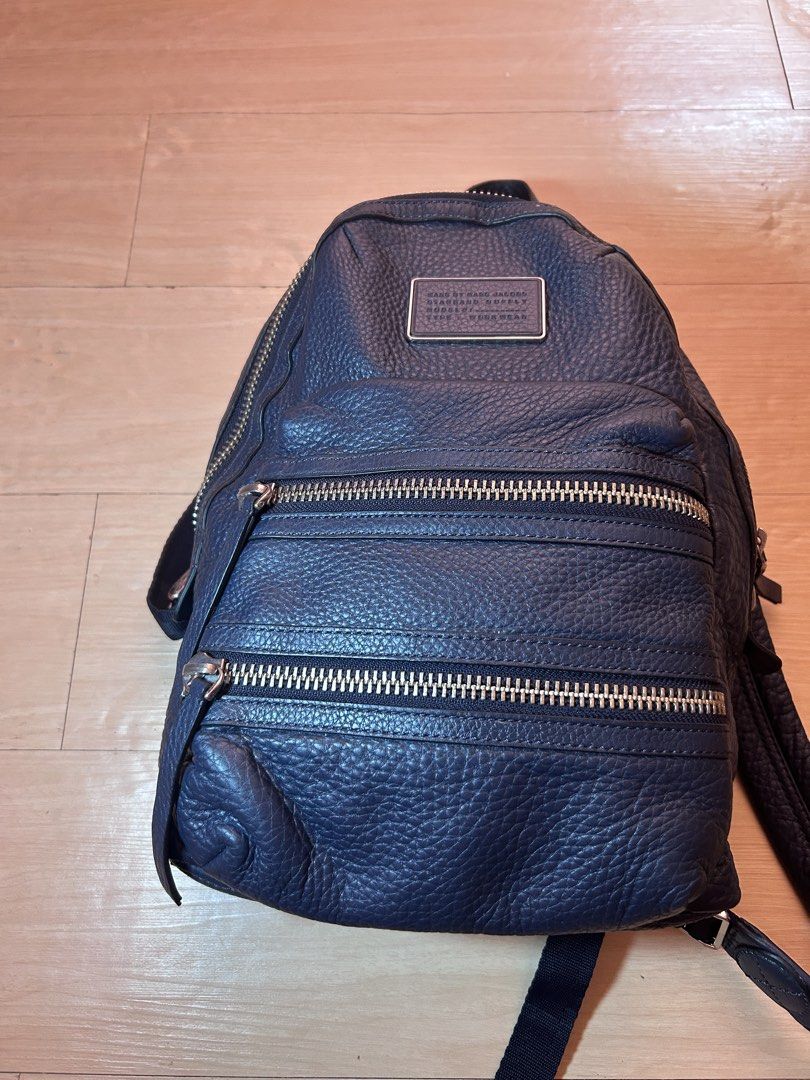 Marc by Marc Jacobs Navy Leather Biker Backpack (Category: Backpacks) located in Dipolog. Submitted by adrian281994 (Listing ID 1464175089, Image 3). Description: - Brand: Marc by Marc Jacobs - Model: Standard Supply - Color: Navy Blue - Material: Leather - Features: Multiple front zippered pockets, adjustable straps - Condition: excellent - Ideal for: Everyday use.