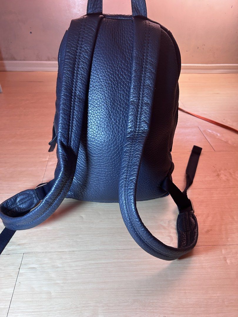 Marc by Marc Jacobs Navy Leather Biker Backpack (Category: Backpacks) located in Dipolog. Submitted by adrian281994 (Listing ID 1464175089, Image 2). Description: - Brand: Marc by Marc Jacobs - Model: Standard Supply - Color: Navy Blue - Material: Leather - Features: Multiple front zippered pockets, adjustable straps - Condition: excellent - Ideal for: Everyday use.