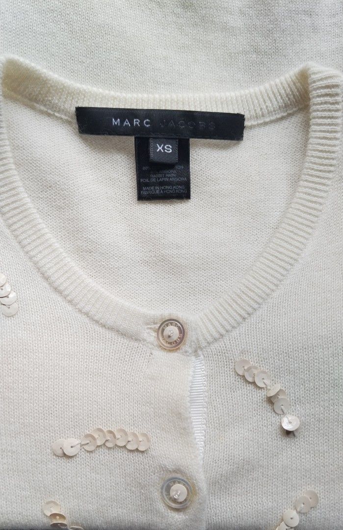 Marc Jacobs Ivory Cardigan (Category: Coats, Jackets and Outerwear) located in Caloocan City. Submitted by modishthriftstore (Listing ID 1464159348, Image 2). Description: No low ballers pls wag po baratin 🙂❤ XS size only stretchable light material No issues loc: Rainbow village 5 North Caloocan.