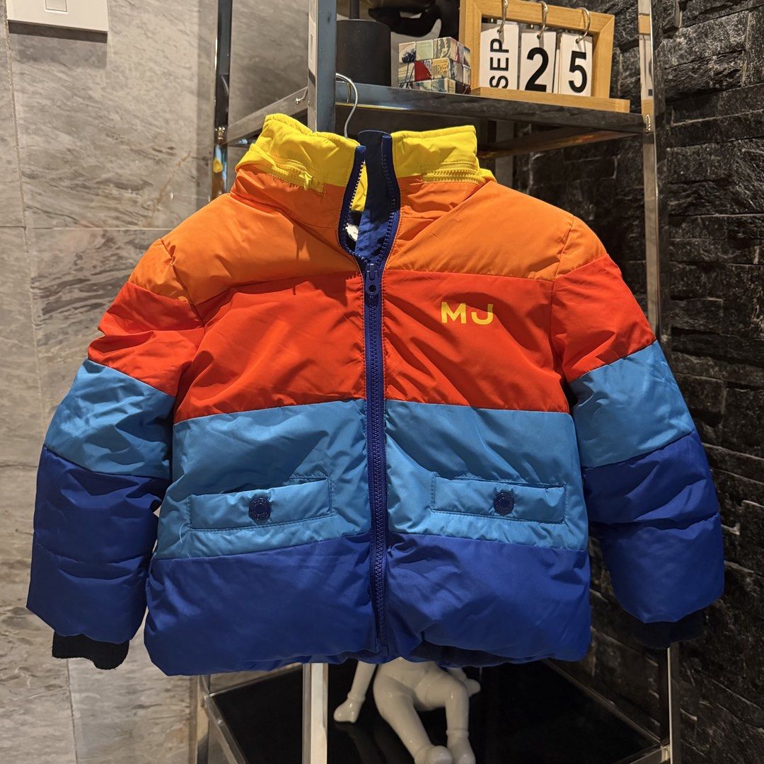 Marc Jacobs Kids Rainbow Puffer Jacket (Category: Babies & Kids Fashion) located in Manila. Submitted by iceonmyneck (Listing ID 1464200009, Image 1). Description: - Authentic Marc Jacobs puffer jacket for kids -Bought in Switzerland - Vibrant rainbow colors with a cheerful yellow hood - Iconic Marc Jacobs logo prominently displayed on the back - Features two convenient front pockets with secure button closures - with hood compartment - Size: S (