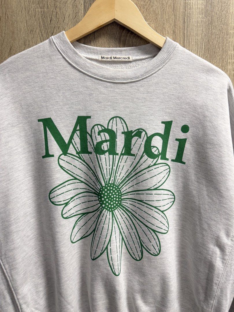 Mardi Mercredi Flower Sweatshirt (Category: Coats, Jackets and Outerwear) located in Cavite. Submitted by PRIVATE.Selection (Listing ID 1464303649, Image 3). Description: Mardi Mercredi Flower Sweatshirt Unisex Size M-L Womens and Size S-M Mens (One size) W 22.5 L 25 Good as new ￼ 1500.