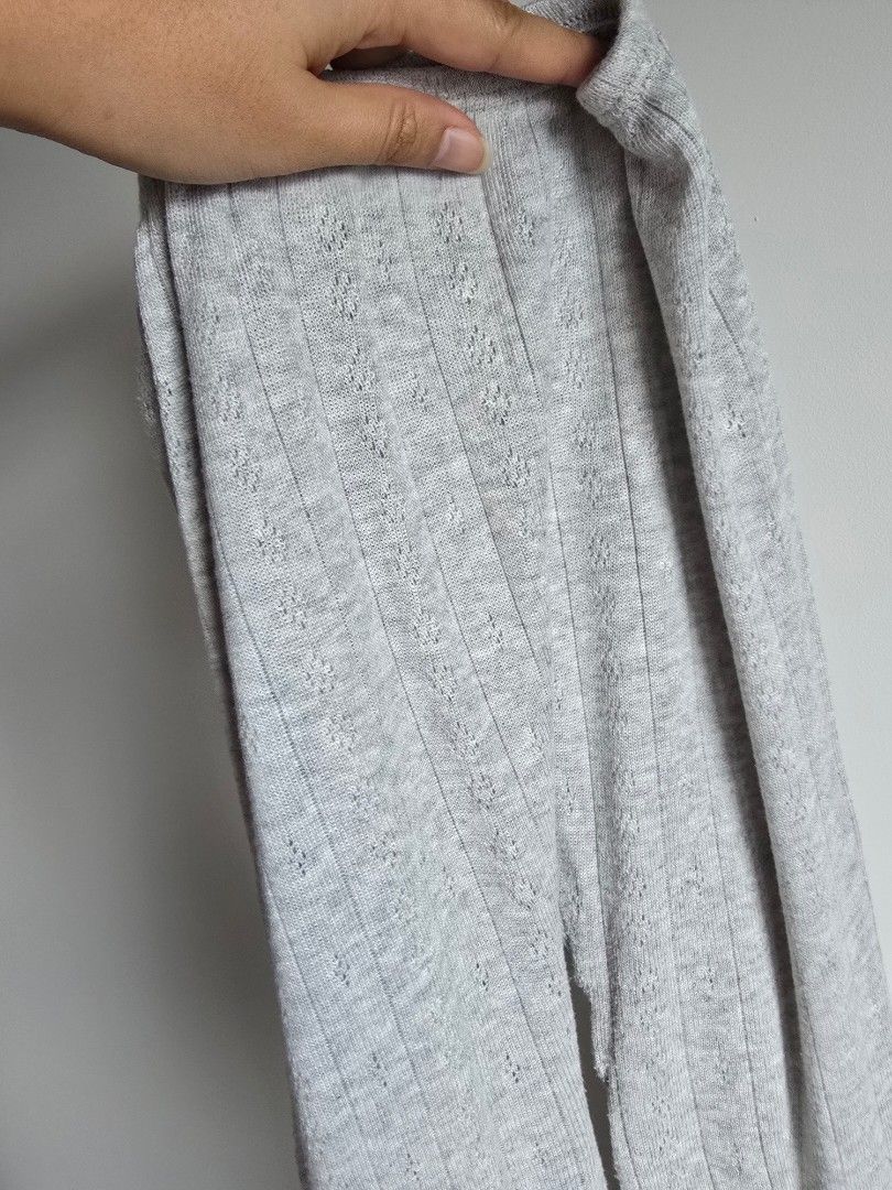 Marks & Spencer Grey Ribbed Knit Thermal Leggings (Category: Activewear) located in Paranaque City. Submitted by incognitopawikan (Listing ID 1464170672, Image 3). Description: - Grey leggings with a chic ribbed knit texture - Features a subtle, stylish cut-out pattern all over - Made with stretchy material for ultimate comfort. - Perfect for layering or as a standalone casual piece. - Effortlessly pairs with any top for a complete look..