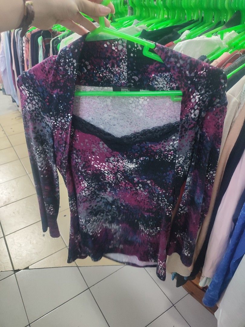 Marks & Spencer Raspberry Mix Print Long Sleeve Top (Category: Longsleeves) located in Jaen. Submitted by roxantiago (Listing ID 1464248755, Image 2). Description: - Marks & Spencer long sleeve top - Size: UK 12 - Color/Pattern: Vibrant raspberry mix print - Detail: Black lace trim around the neckline - Origin: Made in Morocco - Style: Great for casual wear or layering.