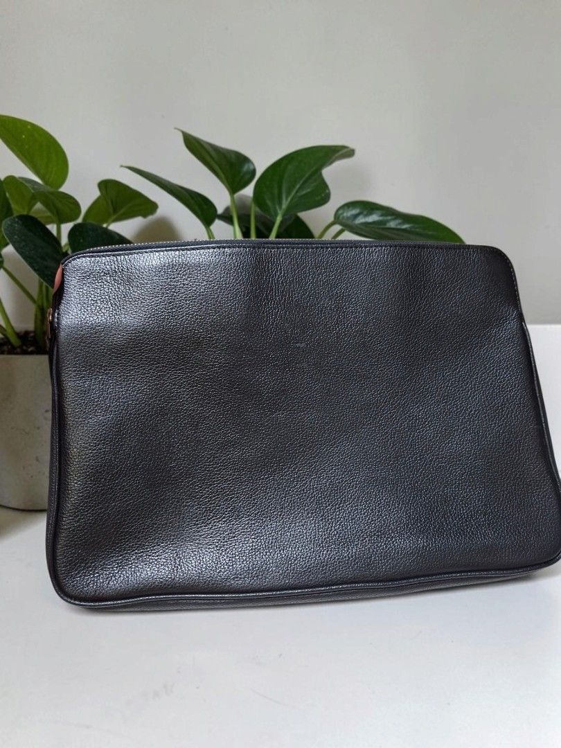 MARUEM LEATHER IPAD LAPTOP SLEEVE (Category: Belt bags, Clutches and Pouches) located in Las Pinas. Submitted by annachiaonair2037 (Listing ID 1464248277, Image 1). Description: MARUEM LEATHER IPAD LAPTOP SLEEVE FROM JAPAN MADE IN JAPAN YKK ZIP H 9" L 13" W 1.5" Disclaimer: I am not affiliated with, associated with, or authorized by any of the brands featured posted. Any mention of brand names, trademarks, or logos is solely for identification an