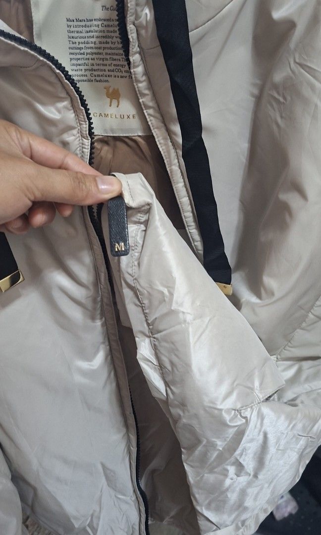 Max mara puffer jacket (Category: Luxury Apparel) located in Manila. Submitted by warmdog.994d4f (Listing ID 1464222292, Image 3). Description: bought it last year in Saudi,hopefully to wear it this year winter,pero hindi na pala ako mkakabalik kasi buntis at hindi ko naman nyan magagamit dito sa pinas 😊 sorry hindi kulang yan na iron kasi nasira ang steamer iron ko pero bago papo tlga yan never pang nagamit from 24+k ibibinta ko nlng ng 8k sana