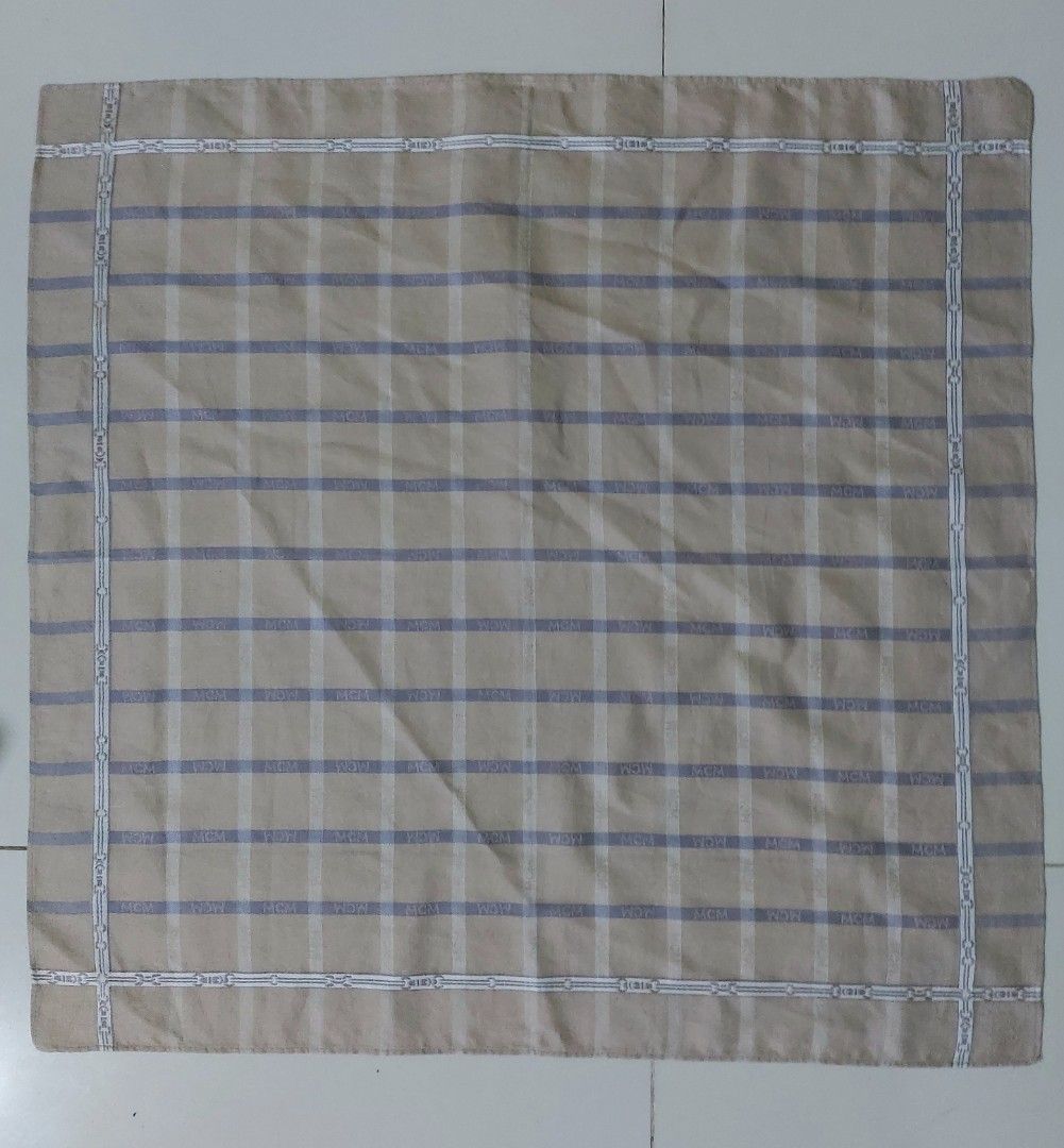 MCM Monogram Plaid Handkerchief (Category: Handkerchief & Pocket Squares) located in Lapu Lapu. Submitted by agnesapm_29813 (Listing ID 1464255210, Image 3). Description: - Authentic MCM Handkerchief - Classic monogram pattern in a subtle plaid design - Features MCM logo details - Border with chain link pattern - Approximate Size: 18 inches x 18 inches - Perfect accessory for your collection - Washed and ironed already .