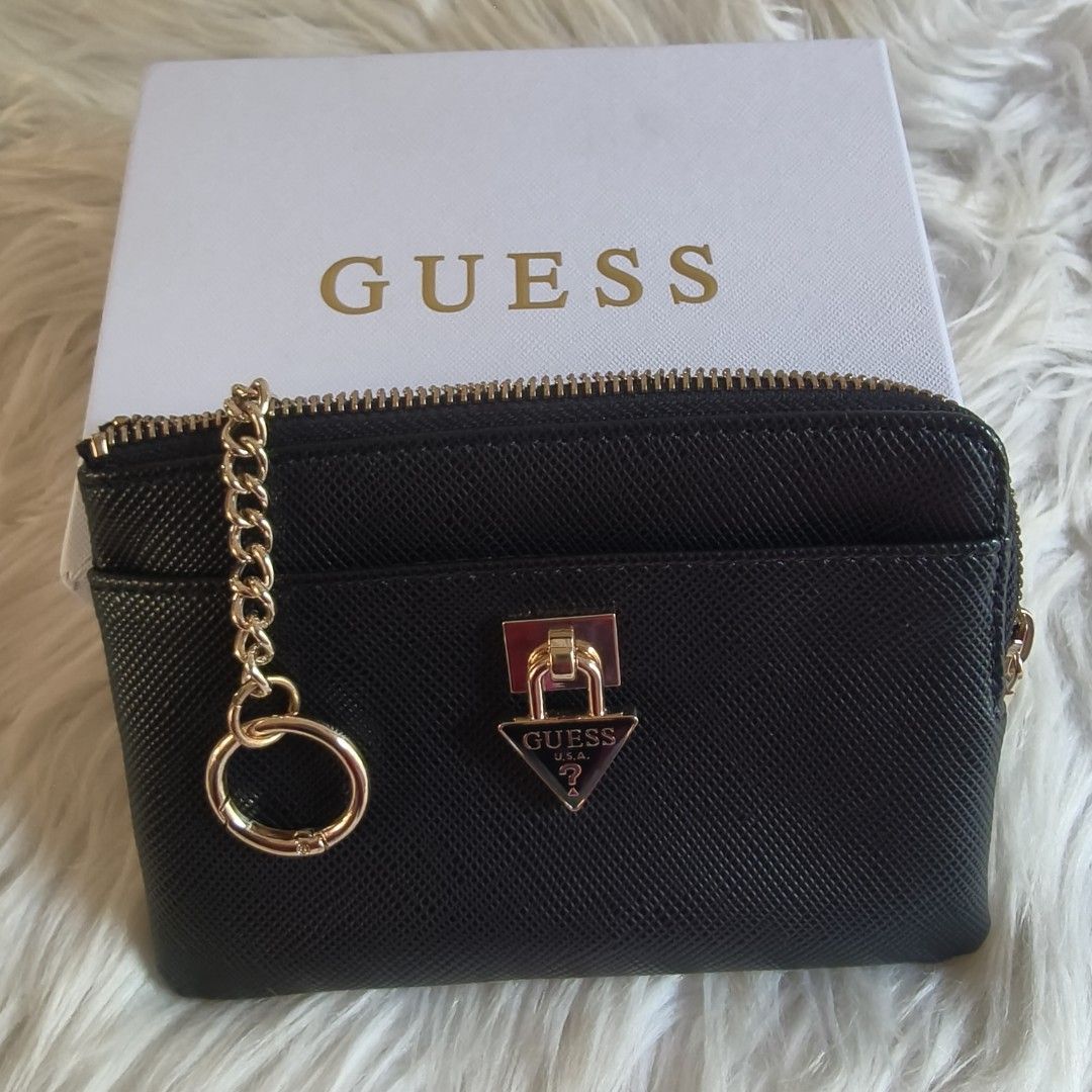 Meduim key ring wallet (Category: Wallets & Card holders) located in General Santos City (Dadiangas). Submitted by zhia_preloved (Listing ID 1464235615, Image 3). Description: Original, good as new condition.